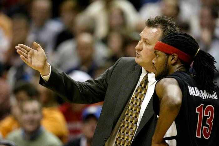 Nov 27, 2004; Indianapolis, IN, USA; Cincinnati guard #13 Jihad Muhammad gets a lecture from coach Bob Huggins during first half action against Purdue at the Wooden Tradition on Saturday at Conseco Fieldhouse. Mandatory Credit: Photo by Joe Robbins-USA TODAY Sports (c) 2004 by Joe Robbins